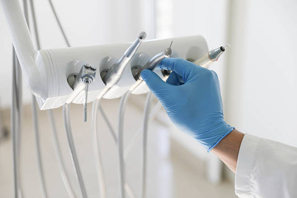 Professional Invisalign Clear Aligners technician working in Fort Lewis, WA